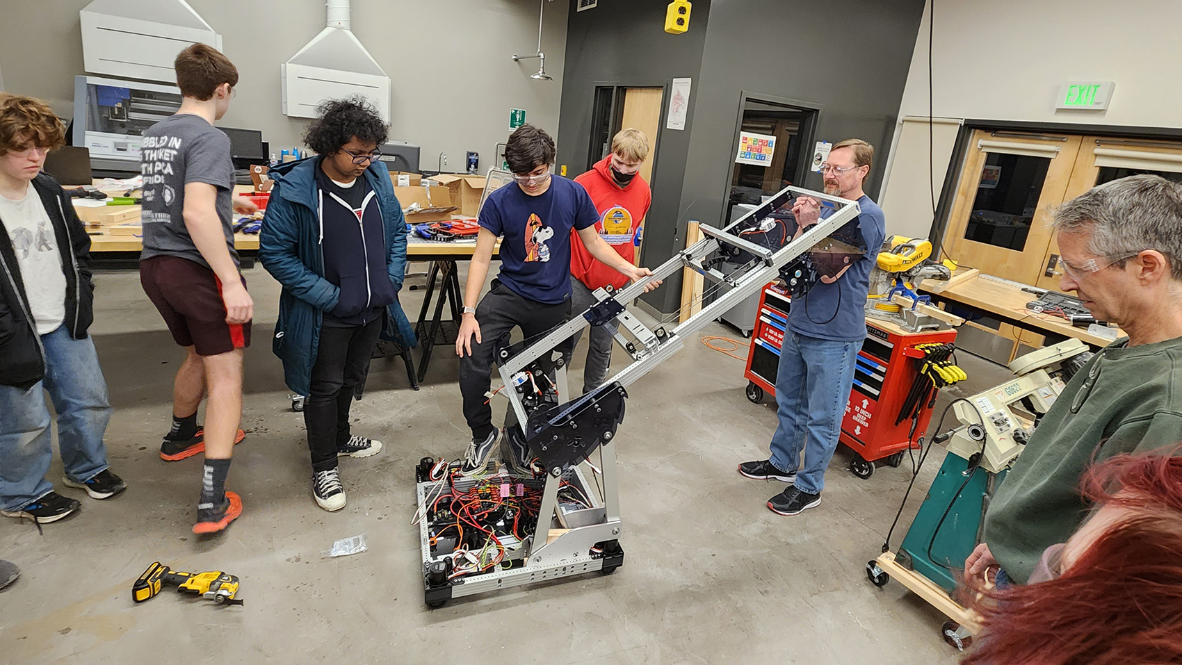 ChainLynx team members working on the robot during the 2022-2023 season